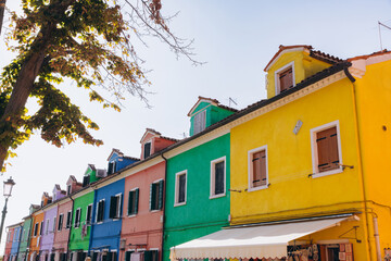 Burano island colorful houses architecture during sunny day