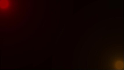 Defocused police red golden emergency lights flashing in the dark Flashing strobe lights from an emergency vehicle defocused to create a smooth bokeh background. Represents any emergency vehicle