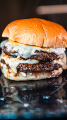 Double deck burger with rare beef patties, melted cheese, homemade mayo, and mustard. Juicy, indulgent, and perfectly cooked. Ideal for gourmet menus.