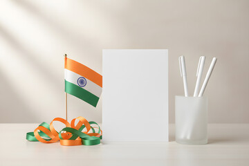 independence day concept featuring blank card, indian flag and stationery