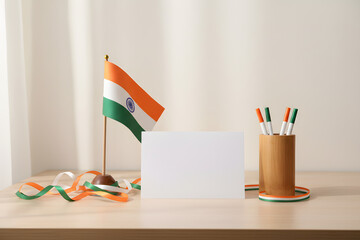 patriotic indian decor on desk with blank greeting card and pen holder