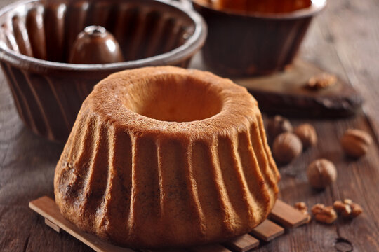 Potica - traditional Slovenian bread cake. Sweet bread roll stuffed with walnuts and sprinkle with sugar