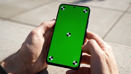 Hand of sports woman holding smartphone with green screen for copy space, mobile fitness app technology for health and workout training, space for advertising - Powered by Adobe