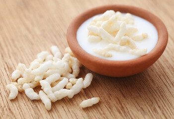Puffed rice with milk in a pottery
