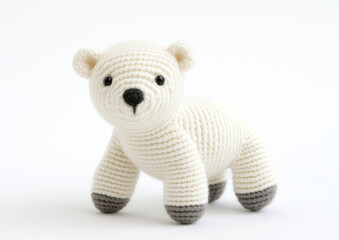 A knitted polar bear toy standing, it&rsquo;s a beautiful craft creation