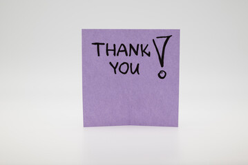 Purple “Thank You” note, symbolizing gratitude, appreciation, and positive communication.