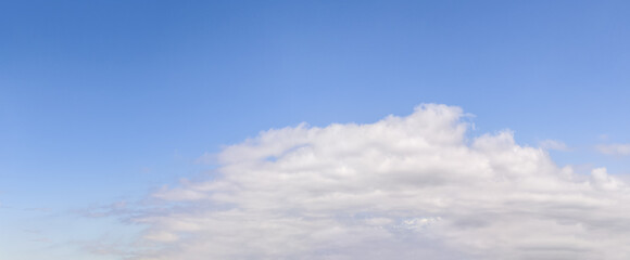 Bright Blue Sky With Wispy Clouds Over Calm Horizon – Cloudscape Background