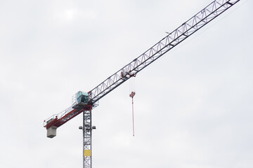 A tower crane at a building construction site