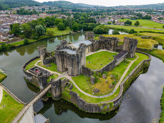 Aerial view of the historic Caerphilly Castle, a medieval fortress in Wales © whitcomberd