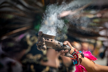 Aztec healer with an urn