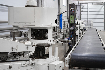 areas for the production of tableware made of sheet iron, buckets for water, conveyor belt