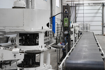 areas for the production of tableware made of sheet iron, buckets for water, conveyor belt