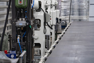 areas for the production of tableware made of sheet iron, buckets for water, conveyor belt