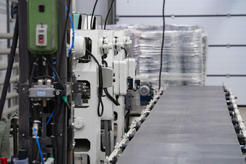 areas for the production of tableware made of sheet iron, buckets for water, conveyor belt