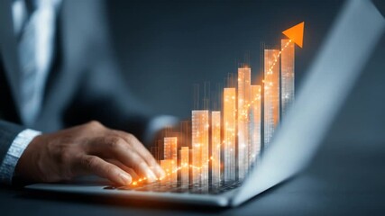 Professional hands typing on laptop with glowing financial growth chart, symbolizing business success, data analytics, and investment strategy. - Powered by Adobe