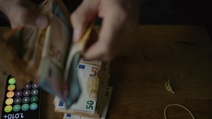 Corrupt businessman counting euro banknotes and hiding cash in envelopes  - Powered by Adobe