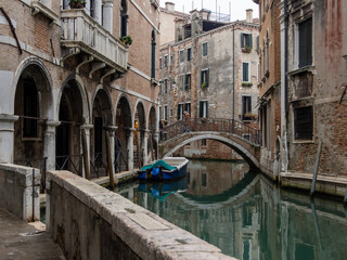 An authentic and tranquil view of a Venetian secondary canal, the Rio di Ca' Widmann, in the Cannaregio district.
