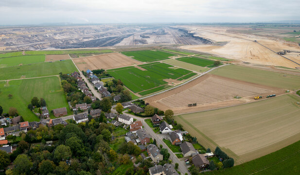 Aerial view of the village of Keyenberg located near mining activities, Germany