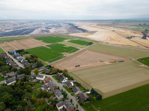 Aerial view of the village of Keyenberg located near mining activities, Germany