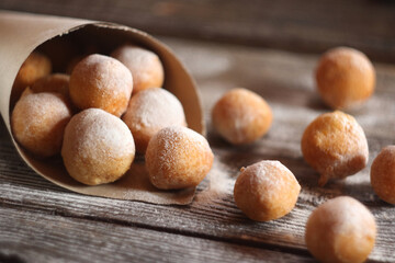 Fritule - Croatian mini doughnuts. Selective focus
