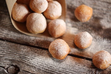 Fritule - Croatian mini doughnuts. Selective focus
