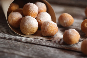 Fritule - Croatian mini doughnuts. Selective focus
