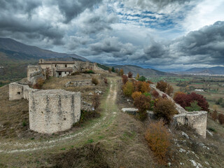 Fototapeta premium Aerial view of Medieval Fortress of Sant'Eusanio Forconese, Abruzzo: A strategic, oval-plan enclosure with five semicircular and four square towers