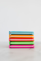 colourful children books on minimalist setup, concept of learning to read and early education