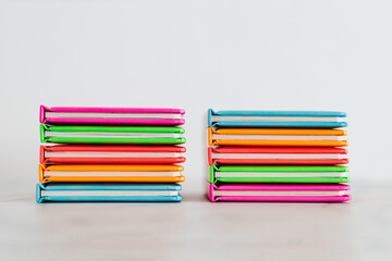 colourful children books on minimalist setup, concept of learning to read and early education