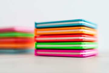 colourful children books on minimalist setup, concept of learning to read and early education