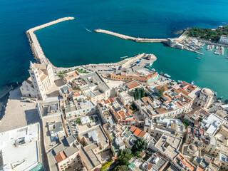 Aerial View of Trani: The Medieval Swabian Castle, Historic Old Town, and Vibrant Fishing Port along the Adriatic Coastline