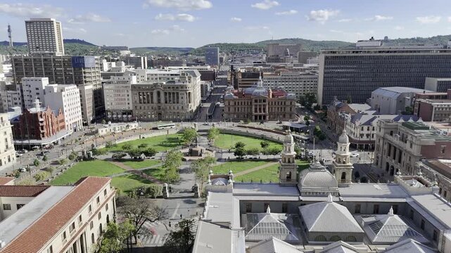 Drone orbits to the right on the northern side of Church Square on sunny day in Pretoria, South Africa