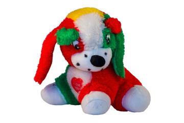 A bright, multicolored plush toy dog featuring red, yellow, white, and green sections. Perfect for children’s toys, holiday decorations, or playful design projects