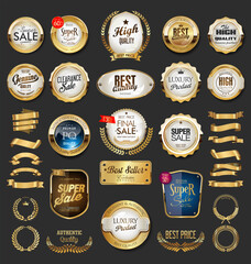 Collection of golden badges, labels, ribbons, and wreaths for promotional and decorative purposes.