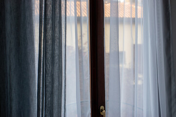 Sad, Quiet Room with Gray Light Through Curtains