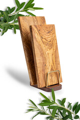Wooden olive cutting board. Olive utensils.