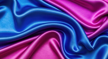Obraz premium Vibrant satin fabric in shades of blue and pink, flowing gracefully