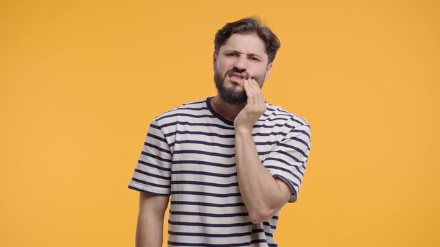 Bearded Man Touching Cheek With Painful Expression, Reacting To Sudden Toothache