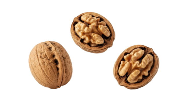 Three walnut halves and one whole walnut displayed against a stark white backdrop forming an artful arrangement for culinary or nutritional uses