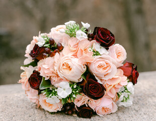 Elegant bouquet of roses and flowers arranged for a special occasion outdoors