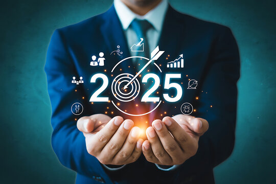 Businessman holding vision for 2025 with business growth and success icons, financial planning and investment strategy concept