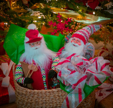 Two Santas  are all packed up and ready for Christmas