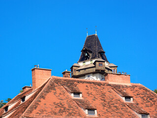 View of rooftops in Graz, Austria and blue sky