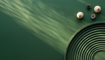 Serene zen garden flat lay with natural elements creating a peaceful scene for meditation, mindfulness, and wellness concepts in tranquil green tones