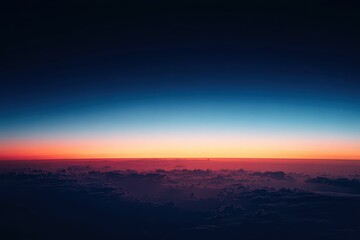 Obraz premium Aerial View Of Cityscape At Sunset With Gradated Sky And Atmospheric Perspective