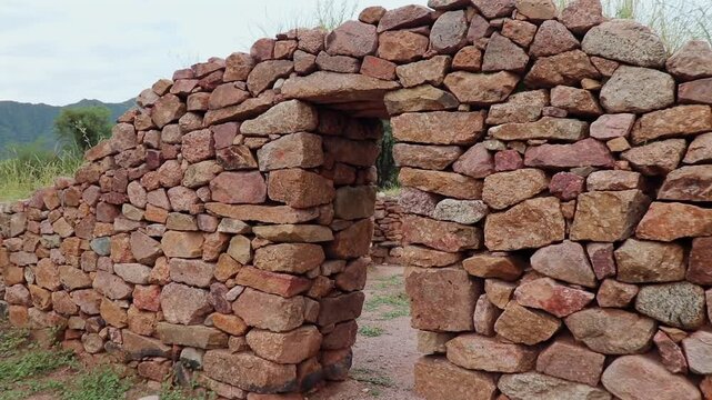 Close up shot of the Inca pirca stone wall remains and foundations of ancient structures at El Shincal de Quimivil Londres Catamarca Argentina