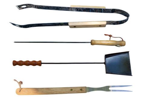 Top view of a set of barbecue tongs, representing the leisure activities of rural outdoor cooking, picnics and camping