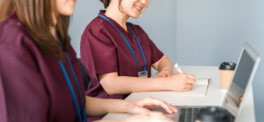 Female medical professionals attending medical conferences, study sessions, seminars, training...