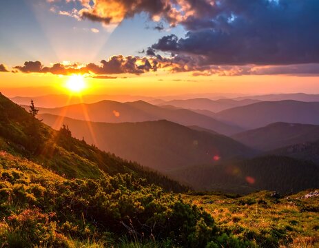 Vibrant sunset over layered, hazy mountains; foreground lush with greenery, sky ablaze with orange, pink, and cloud formations
