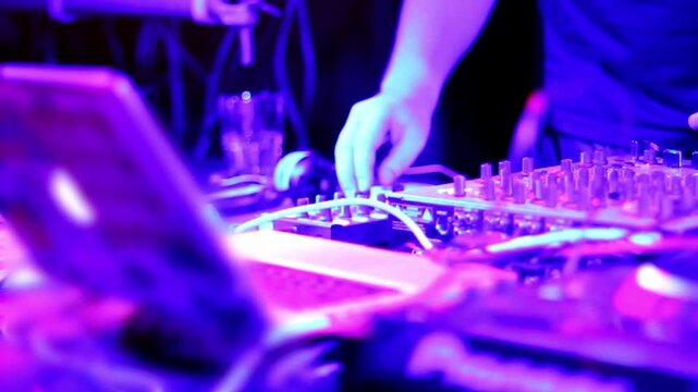 dj mixer controller, composing mix and rocking the party in a nightclub nightlife concept 4k footage
